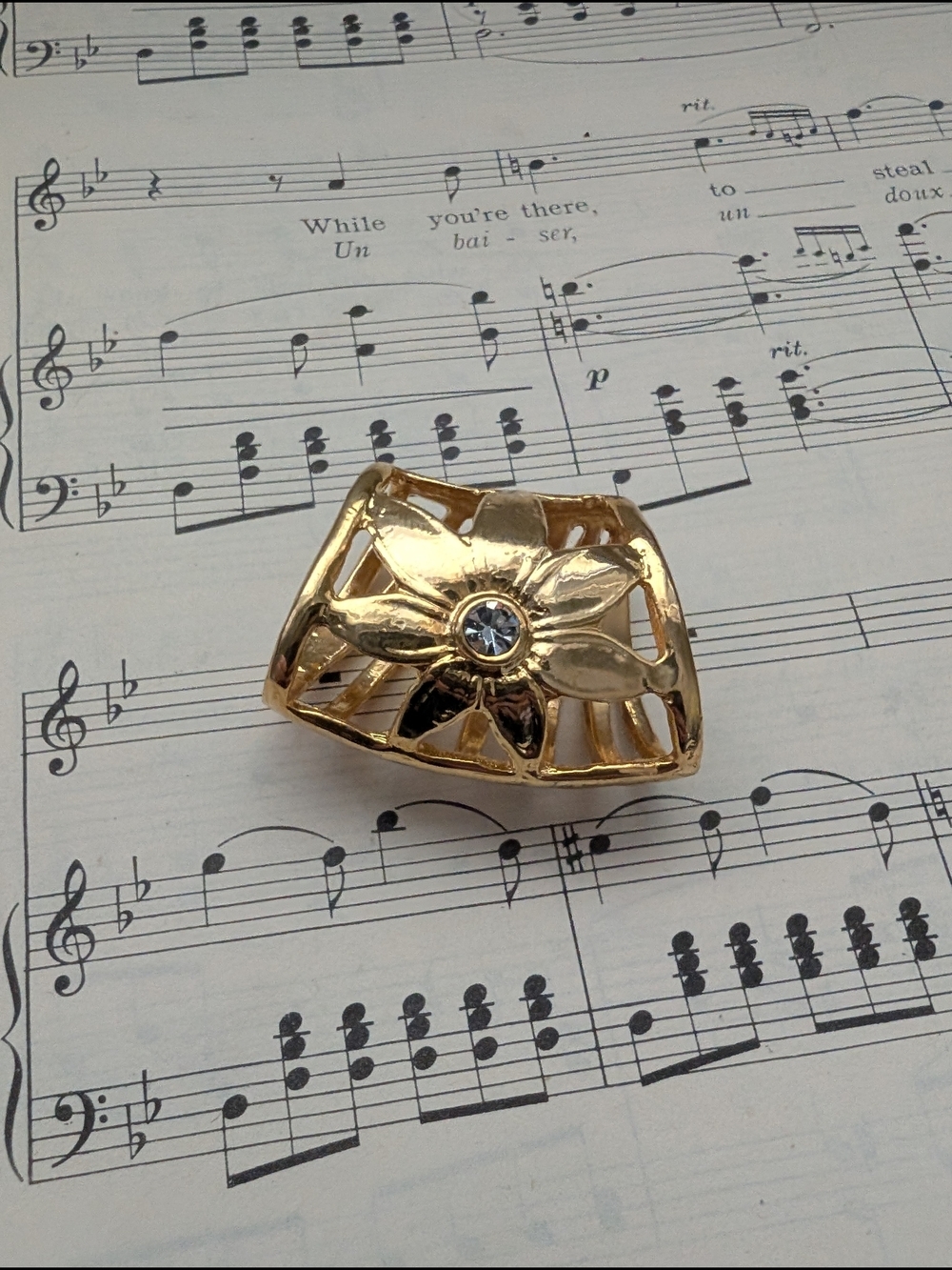 Goldtone Floral Scarf Slide with Clear Gem